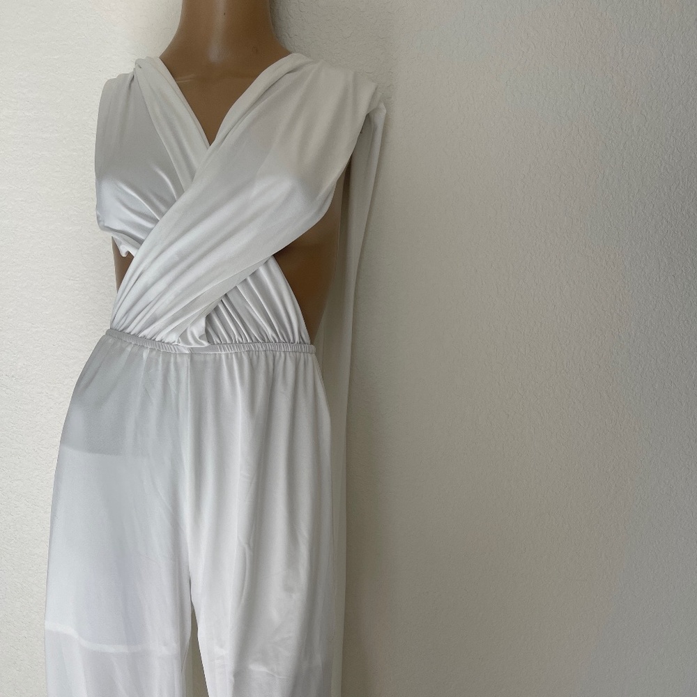 Brand new white  Nastygal jumpsuit  size XS but will fit M